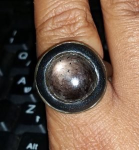 Black ring with dark star ruby