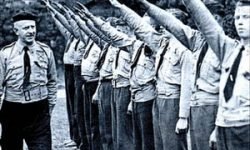 A line of nazi soldiers giving the salute.